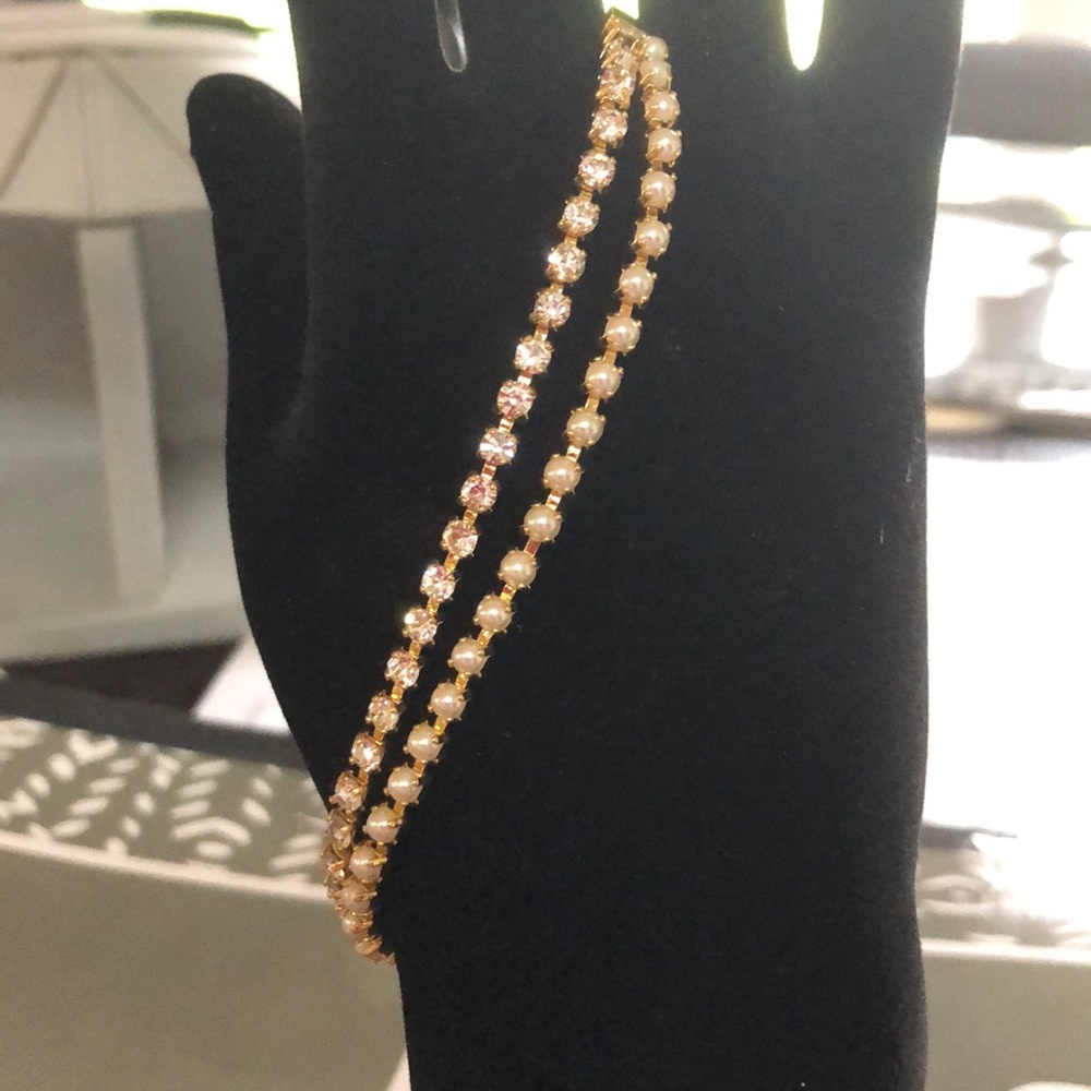 Gold tone pearl and rhinestone bracelet